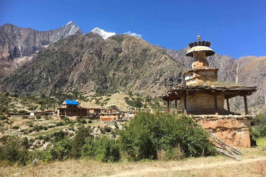 Traditional Tibetan chorten and village in Upper Dolpo